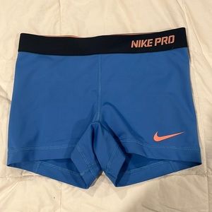 Nike Women’s pro 3” shorts, size S, light blue with coral Nike emblem
